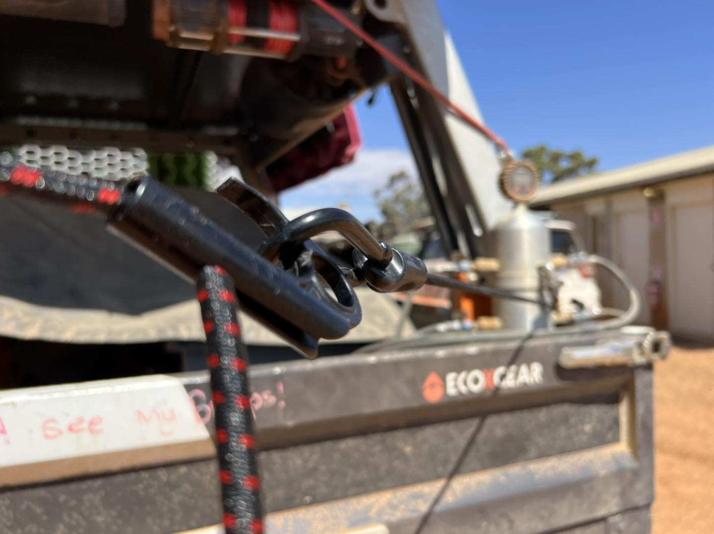 Bungee cords being used to secure load to a vehicle